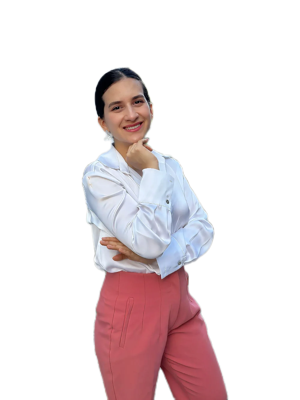 Cristina, neuroeducadora, sonriendo con los brazos cruzados